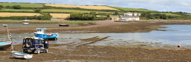 The Ridge, bridleway over causeway, Ruth walking the coast, Angle Bay