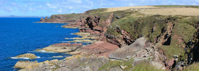 09 coloured rocks, Ruth on the Pembrokeshire Coast Path, Wales