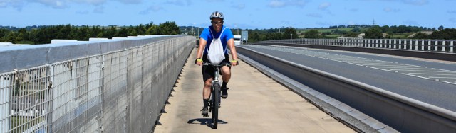 12 hubby cycling across Cleddau Bridge, Pembrokeshire