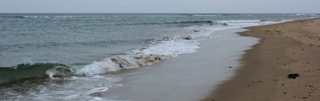 03 lonely sands, Ruth hiking towards Tywyn from Aberdovey