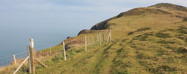 03 steep climb up cliffs, Ruth walking the Ceredigion Coast Path, Llanrhystud