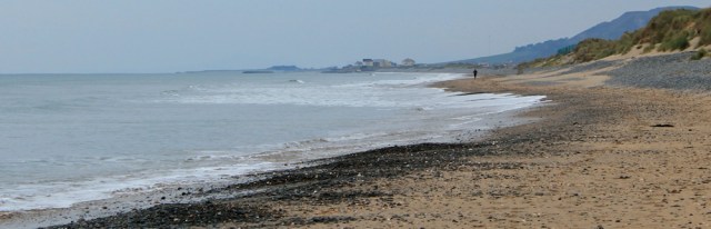 04 lone jogger, Ruth walking along the beach from Aberdyfi to Tywyn, Wales