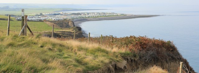 04 looking back at Llanrhystud, Ruth on the Ceredigion coast trail