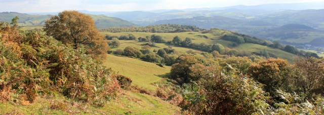 05 looking back towards Machynlleth, Ruth on the Wales Coast Path