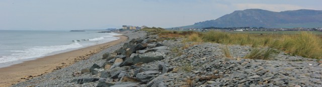 05 Tywyn getting nearer, Ruth trekking the Welsh Coast