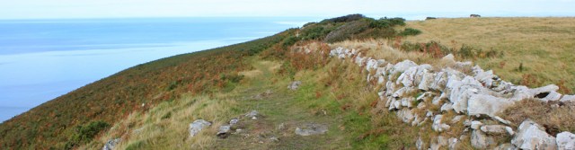 b12 the top at last, above Cwmtydu, Ruth walking the Ceredigion Coast Path