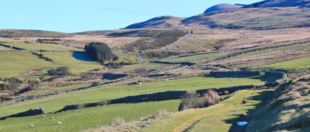 05 farm tracks above Fairbourne, Ruth walking the Wales Coast Path