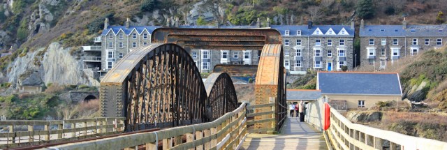 25 end of Barmouth Bridge, Ruth hiking in Wales