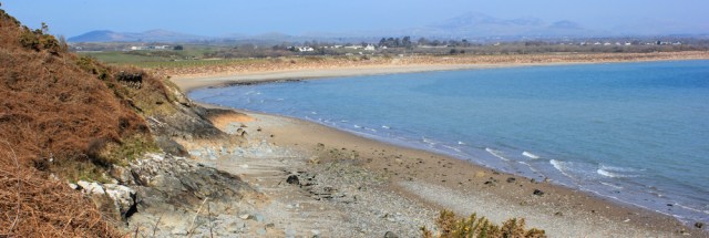 08 looking back over Y Gamias Bay, Ruth hiking the Lleyn Peninsula
