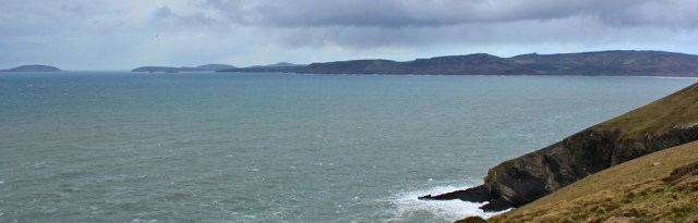 13 looking across Porth Neigwl, Ruth walking the Llyn Coastal Path