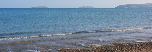 18 St Tudwal's Islands, Ruth walking towards Abersoch, Llyn, Wales