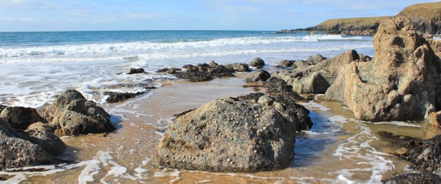 20 end of Porthor Beach, Ruth walking the Llyn Peninsula