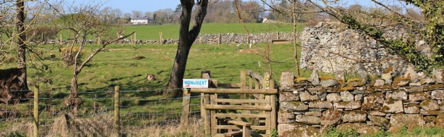05 monument sign, Ruth walking the Anglesey coastal path