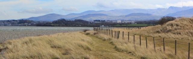 07, rounding the corner, Ruth walking the sandunes of Morfa Dinlle