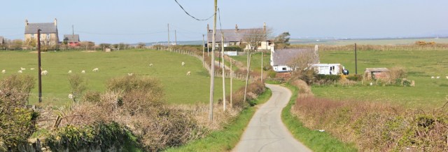 12 road walking continues, Ruth hiking in Anglesey