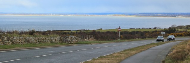 14 A499 towards Caernarfon, Ruth on the Wales Coast Path