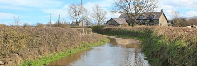 20 another flooded road, Ruth walking to Caernarfon
