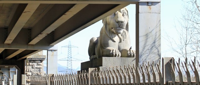 24 lion on Pont Britannia, Ruth walking the Anglesey Coast Path