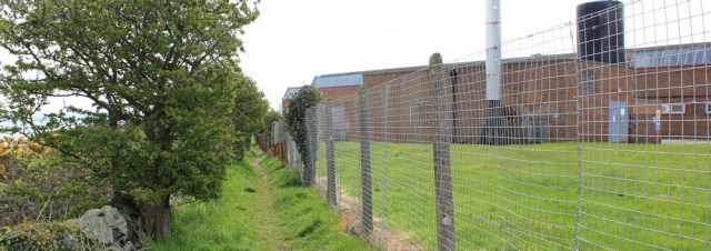 10 industrial units, Ruth walking out of Holyhead