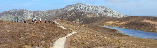 17 Holyhead Mountain, Ruth hiking the Isle of Anglesey coast path