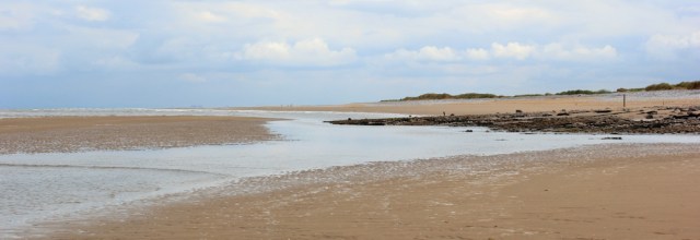 02 walking towards Point of Ayr, Ruth walking the Wales Coast Path