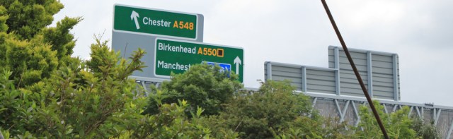 11 Manchester road sign, Ruth hiking the River Dee
