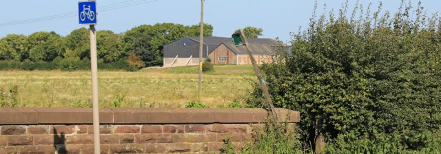 03 footpath sign, Ruth hiking the coast, Ribble Valley
