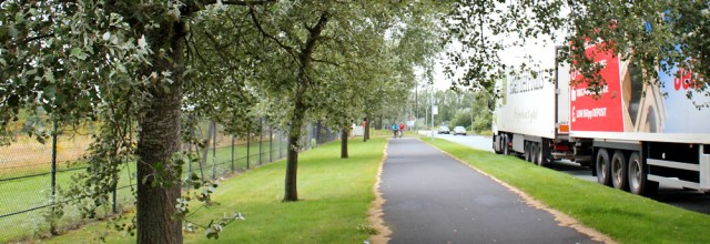 08 Ruth walking through the Deeside Industrial Park