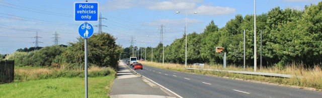 10 road walking out of Preston, Ruth walking the English Coast