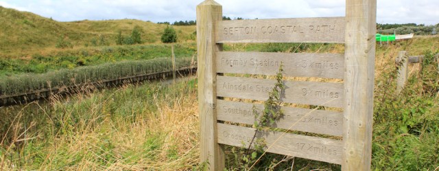19 Sefton Coastal Path sign, Ruth hiking the coast of England