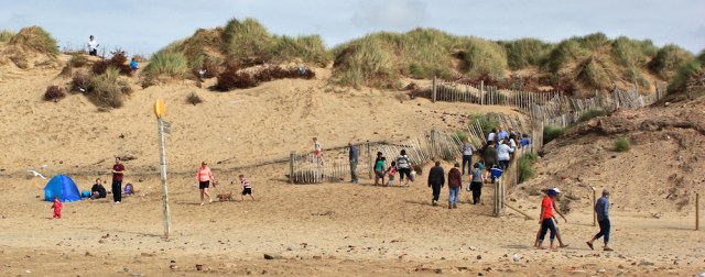 32 Mad Wharf, Ruth hiking along Formby Beach