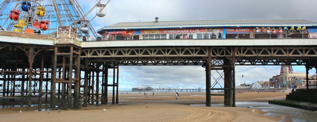09-under-central-pier-ruth-walking-blackpool-beach