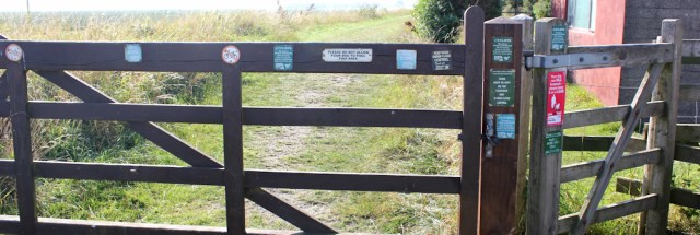 41 signs on the gate, Warton Bank, Ruth Livingstone trying to walk the coast