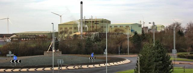 06-past-factories-ruth-hiking-through-workington