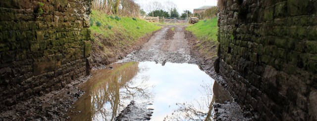 a28-railway-bridge-and-giant-puddle-ruth-livingstone-walking-the-english-coast-cumbria