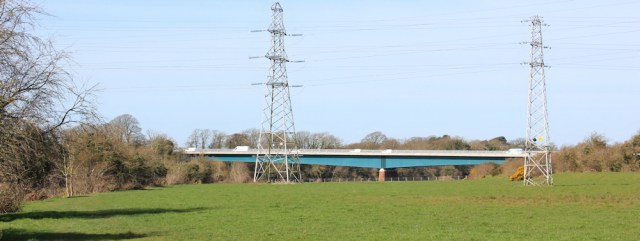 09 Road bridge across River Eden, Ruth hiking through Carlisle