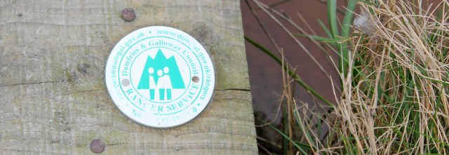 06 Ranger Service sign on bridge, Ruth hiking to Dumfries, Scotland