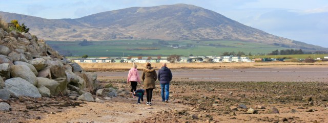 41 Southerness beach, Ruth walking in Dumfries and Galloway