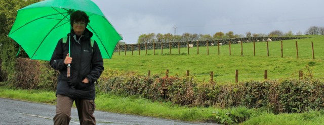 01 Ruth and her green umbrella, hiking in Scotland