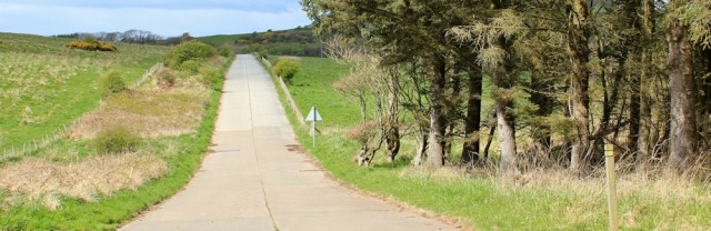 20 MOD road, Ruth hiking through the Kirkcudbright ranges, Scotland