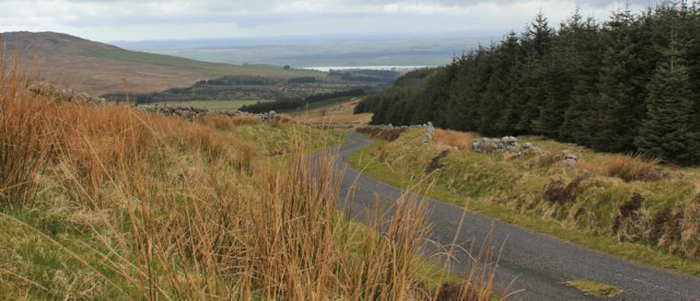 20 top of climb, Cambret Hill, Ruth hiking along Slakes Road, Dumfries and Galloway