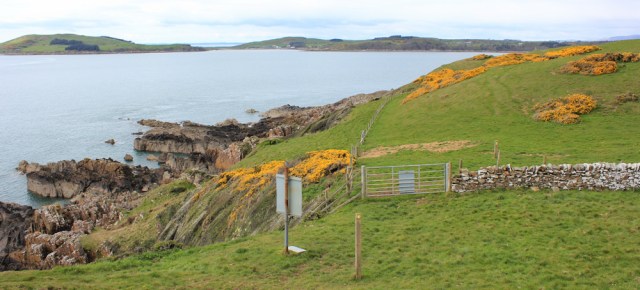 27 leaving MOD land, Ruth in Kirkcudbright Bay, walking the coast