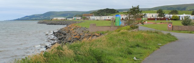 05 Loch Ryan and holiday park, Ruth hiking the Mull of Galloway Trail