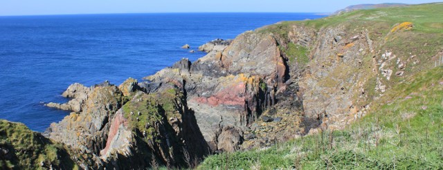 08 coloured rocks, Ruth hiking to St Ninian's Cave, Galloway, Scotland