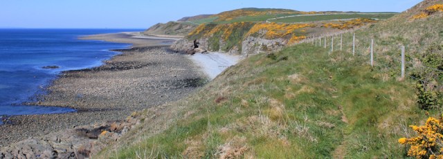 11 St Ninian's hermit cave, Ruth hiking the coastal path, Galloway, Scotland