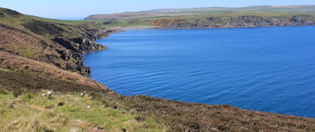22 looking back to Tarbet Bay, Ruth walking the Mull of Galloway Trail, Scotland