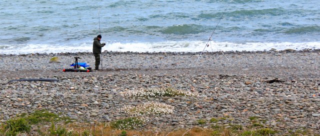 27 fisherman, Terally Bay, Ruth hiking the Mull of Galloway Trail