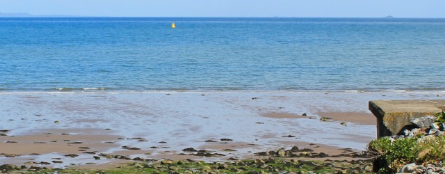 33 Luce Bay and bombing cones, Ruth hiking the Mull of Galloway Trail