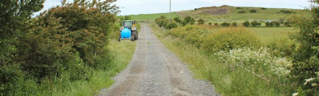 15 track to sea, Ruth hiking the Ayrshire Coastal Path, Scotland