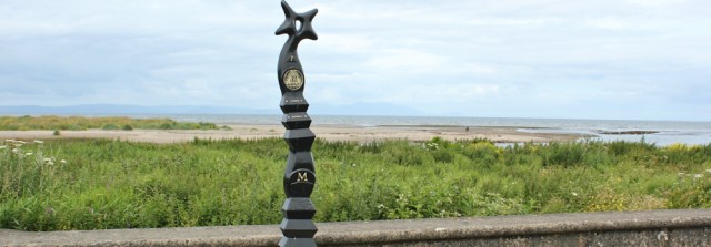 16 cycleway sign, Ruth hiking the coast of Scotland